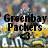 Pixelated static image with bold black text 'Greenbay Packers' over a blurred background of yellow, blue, and gray tones.