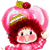 Pixelated cartoon character with red hair wearing a pink strawberry-shaped hat featuring a green leaf and small red berry on top, set against a white background.