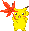 Pixelated yellow Pokémon character with brown-tipped ears holds red maple leaf prop, standing against gray background.