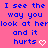 Blue text on pink background repeats 'I see the way you look at her and it hurts' with heart symbols, partially obscured by gray rectangle.