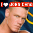 Pixelated image of a person with short light brown hair wearing a dark blue shirt with yellow stripes, overlaid with red text reading "I ❤️ JOHN CENA" in two versions where the heart symbol alternates between white and red.