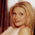 A pixelated contact sheet showing a woman with blonde hair in a white top on the left and green text reading "Original Icons .com" on the right, both rendered at low resolution.