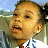 A pixelated contact sheet showing two frames of an animated icon featuring a person on the left and "Johnson Family Vacation" text on a green background on the right.