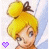 Pixelated cartoon character with yellow hair in a high bun, brown bow, purple heart symbol at bottom left.