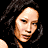 Animated sequence of a person in a black beaded bikini top against a black background, showing sequential arm and torso movements.