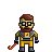 Pixel art of a character with brown hair and beard, wearing glasses, yellow armor with gray accents, holding an orange curved object against a plain background.