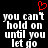 Black background with white pixelated text reading "you can't hold on until you let go" and a red heart symbol above the text.