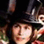 Pixelated image with four text on bright pink background, featuring a person in dark hat and red clothing