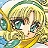 Pixelated close-up of a character with light brown hair, teal eyes, and a yellow top, set against a green and blue background.