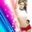Pixelated image of a person in white top and red shorts against colorful gradient background with blue, purple, pink, yellow hues.