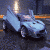 Four- shows a blue sports car in various states: open door, closed door, silver variant, and text 'LIKE CARS' with exclamation mark