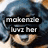 A static image of a dog with curly dark fur and light brown face, overlaid with multiple text blocks in white pixelated font on black backgrounds.