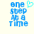 Blue pixelated text reads 'one step at a time' with a cyan heart symbol above the word 'time', displayed on a light background.