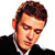 Static pixelated image of a person's head and shoulders in formal attire against white background