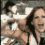 A 4-frame animated contact sheet showing a woman in various poses with her arm raised, wearing a white sleeveless top and dark tie against a blurred background.