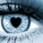 A pixelated eye with a heart-shaped pupil on the left, paired with cyan text on a dark blue background describing a person's appearance and personality.