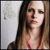 six showing a woman with long hair in various poses and expressions, including singing into microphones and static portraits, with purple text overlays