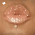 Animated close-up of lips with white dots, a small plus sign in top-left corner, and the word 'Sexy' at bottom-right.