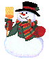 Pixelated snowman with black top hat, red-and-green striped scarf, green coat, and orange carrot nose holding a yellow shovel against gray background.