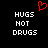 Red pixelated heart symbol above white pixelated text 'HUGS NOT DRUGS' on black background, repeated side-by-side.