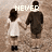 Two figures holding hands on a textured brown background, with changing text above them.