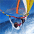 Pixelated static image of a person surfing on blue water with orange and yellow surfboard elements against a gradient sky background.