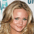 A woman with long wavy blonde hair and blue eyes smiles slightly, wearing a light-colored top against a backdrop of repeating 'GMA' text in teal.