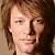 A four- shows a person with light brown hair in different poses and lighting conditions