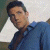 A pixelated image of a person in a blue shirt against a light background, with green text reading 'Original Icons .com' on the right side.