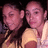 Two pixelated figures with pinkish skin tones, one wearing a dark top and the other in light-colored clothing, positioned closely together against a dark background.
