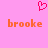 Pink background with a red pixelated heart icon above two orange 'brooke' text labels.