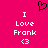 A static image with a bright pink background displays white pixelated text reading "I Love Frank" with a heart symbol below, and a black pixelated heart symbol above the text.