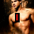 A muscular shirtless man with long hair appears in two , one showing a red 'I' and the other 'love', with pink text reading 'Taylor Lautner' below
