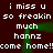 Dark brown background with white pixelated text repeating 'i miss u i miss u so freakin so freakin much much hanz hanz come home!kome home!!' in two vertical , green glowing lines forming a frame around the center