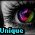 Four identical close-up images of a cat's eye with rainbow-colored irises arranged in a , each overlaid with the word 'Unique' in different colors