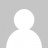 A static pixelated image of a white rounded shape against a gray background with no visible text or distinct features.