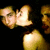 Pixelated image of two figures in close physical contact against a dark background with yellow text reading "Hot night 08" on the right.