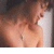 A pixelated image shows a person with light brown hair leaning against a white vertical surface, with text reading 'i ❤️ dan' at the bottom right.