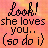 Pixelated text on a gradient background reads 'Look! she loves you.. (so do i)' with black lettering and orange-pink hues.