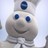 Pixelated static icon of a cartoonish character with blue eyes and a round nose, wearing a white chef's hat against a light background.