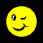 Static pixelated yellow smiley face icon with one open eye, one winking eye, and a curved mouth on black background.