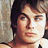 A pixelated image of a person with brown hair and light skin, next to white text reading "Ian Somerhalder" on a gray background.