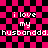 Pixelated pink and black checkered background with repeated white text 'i love my husbanddd. husbanddd.' in a pattern