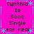 Pixelated text and symbols on a bright pink background with cyan decorative elements arranged in a pattern