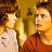 Static 48x48 pixel icon depicting two characters from Back to the Future in a warm-toned indoor setting with yellow lighting and brown background elements.