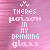 Pixelated text reads 'THERES poison IN MY DRINKING glass' on a pink gradient background with small heart symbols above the text.
