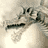 A 48x48 pixel animated icon featuring a stylized dragon head in three sequential frames showing mouth movement, rendered with low-resolution grayscale pixels and visible dithering on a gray background.