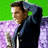 Pixelated image of a person in a dark jacket holding a microphone against a green and purple background with purple text reading "you can't stop the beat".