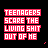 Pixelated text in red and white reads "TEENAGERS SCARE THE LIVING SHIT OUT OF HE" across a black background with small pink heart symbols.