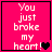 Pixelated pink square with white text "You just broke my heart!" and a black heart symbol, transitioning to a broken heart symbol.